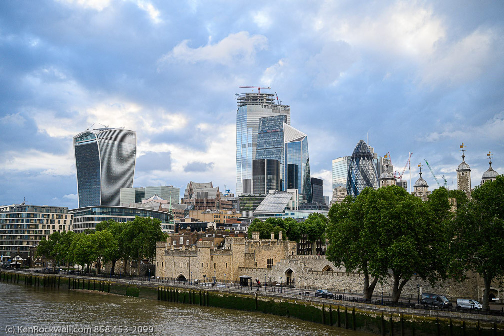 Juxtaposition - The Walkie Talkie and the Gherkin flank the Tower of London 0276