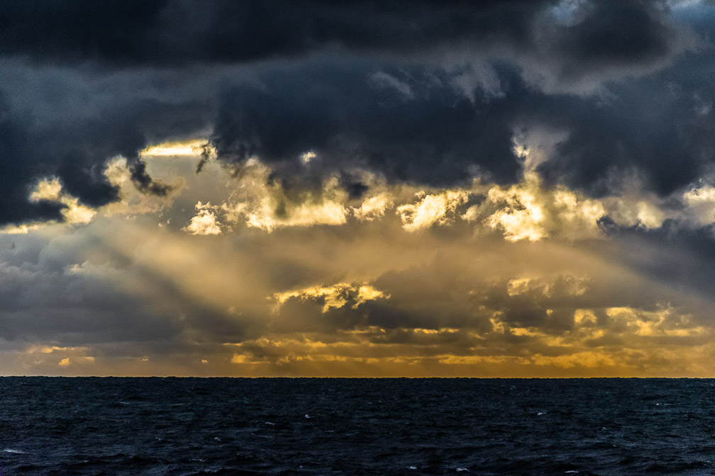 A Golden Sunrise shaped by low patchy clouds   1356