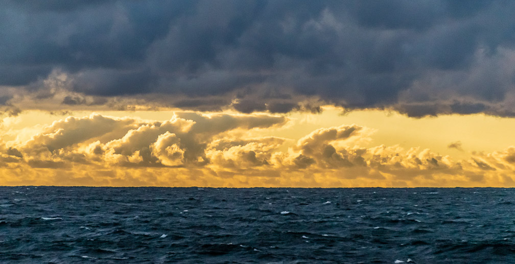 A Golden Sunrise shaped by low patchy clouds   1360